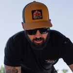 Riser Curved Brim Trucker Hat | Color: Burnt Orange Black
